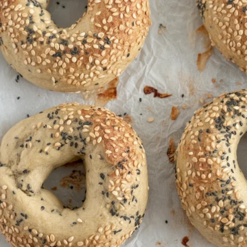 Two delicious freshly baked Almond Flour Bagels made with almond flour and Greek yogurt.